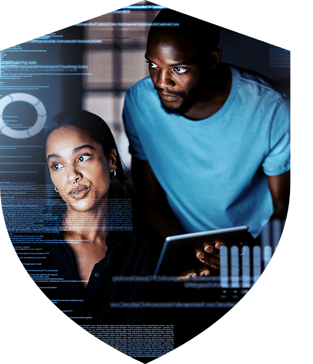 Two professionals analyze data on a transparent digital screen in a modern office.